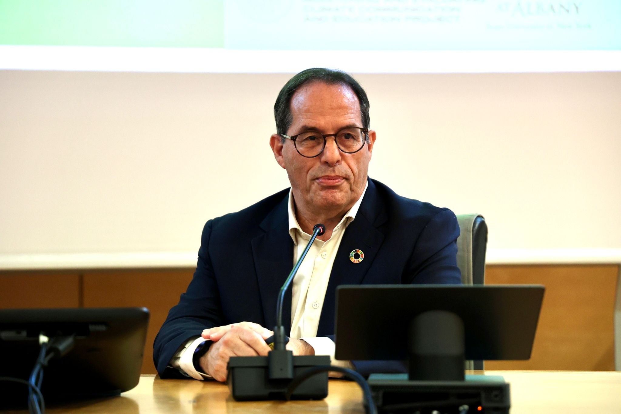 Image of Aaron Banavot looking into the audience from the stage