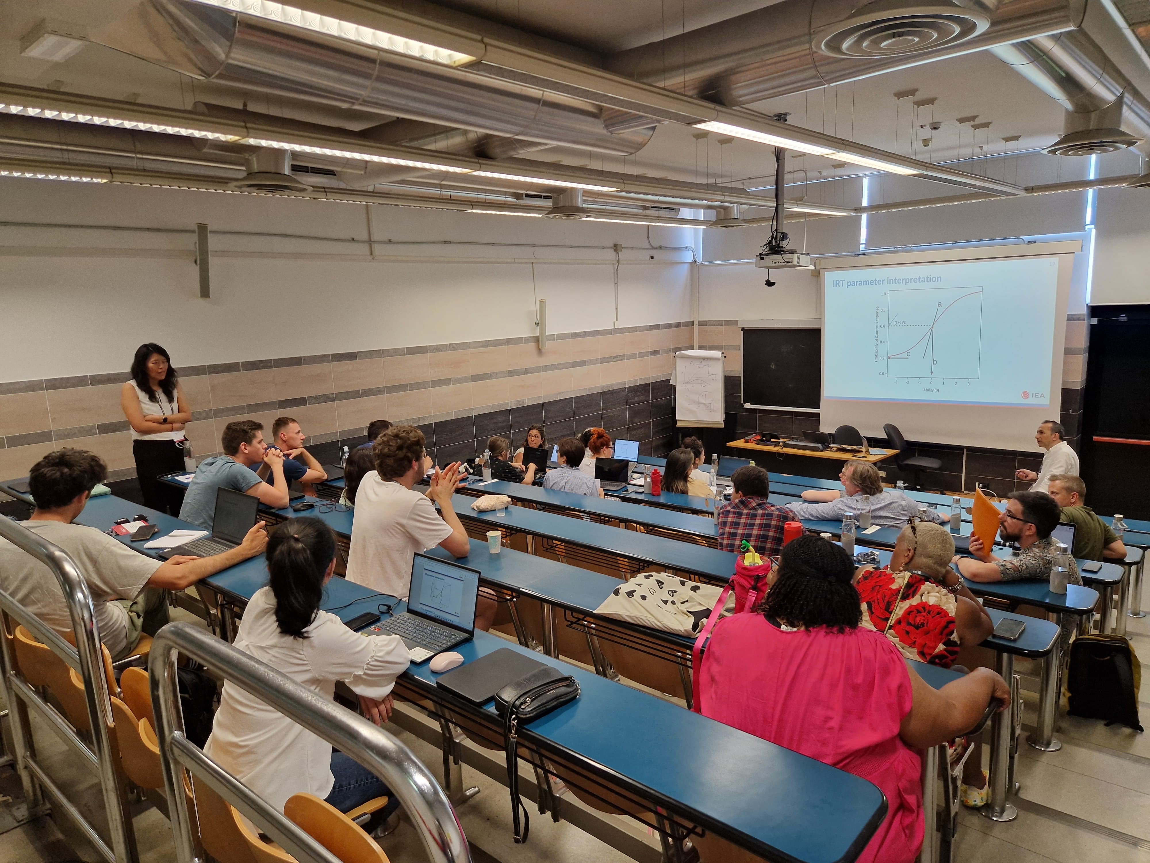 Workshop audience and leaders sitting in a lecture hall