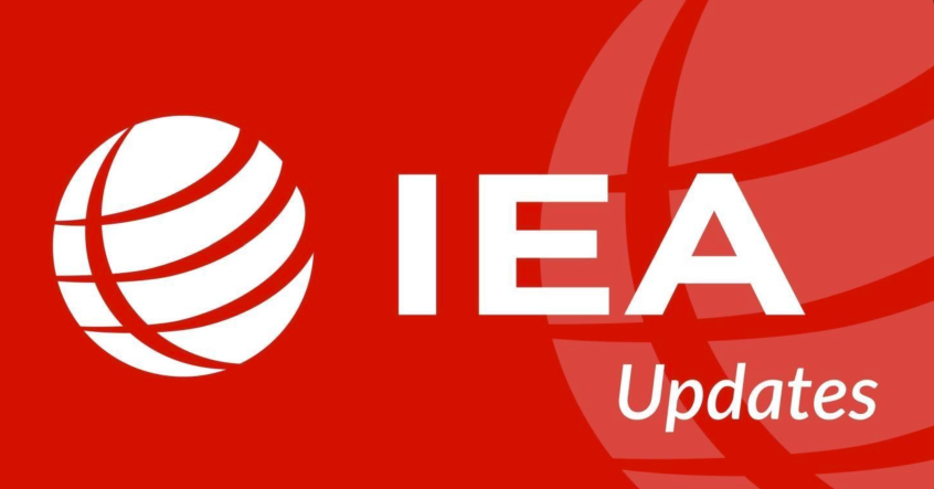 IEA logo on a red background