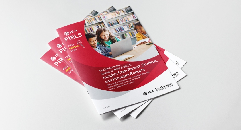 Front cover of report with title, children at the computer, and IEA PIRLS logo