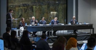 Members of the General Assembly attend a discussion
